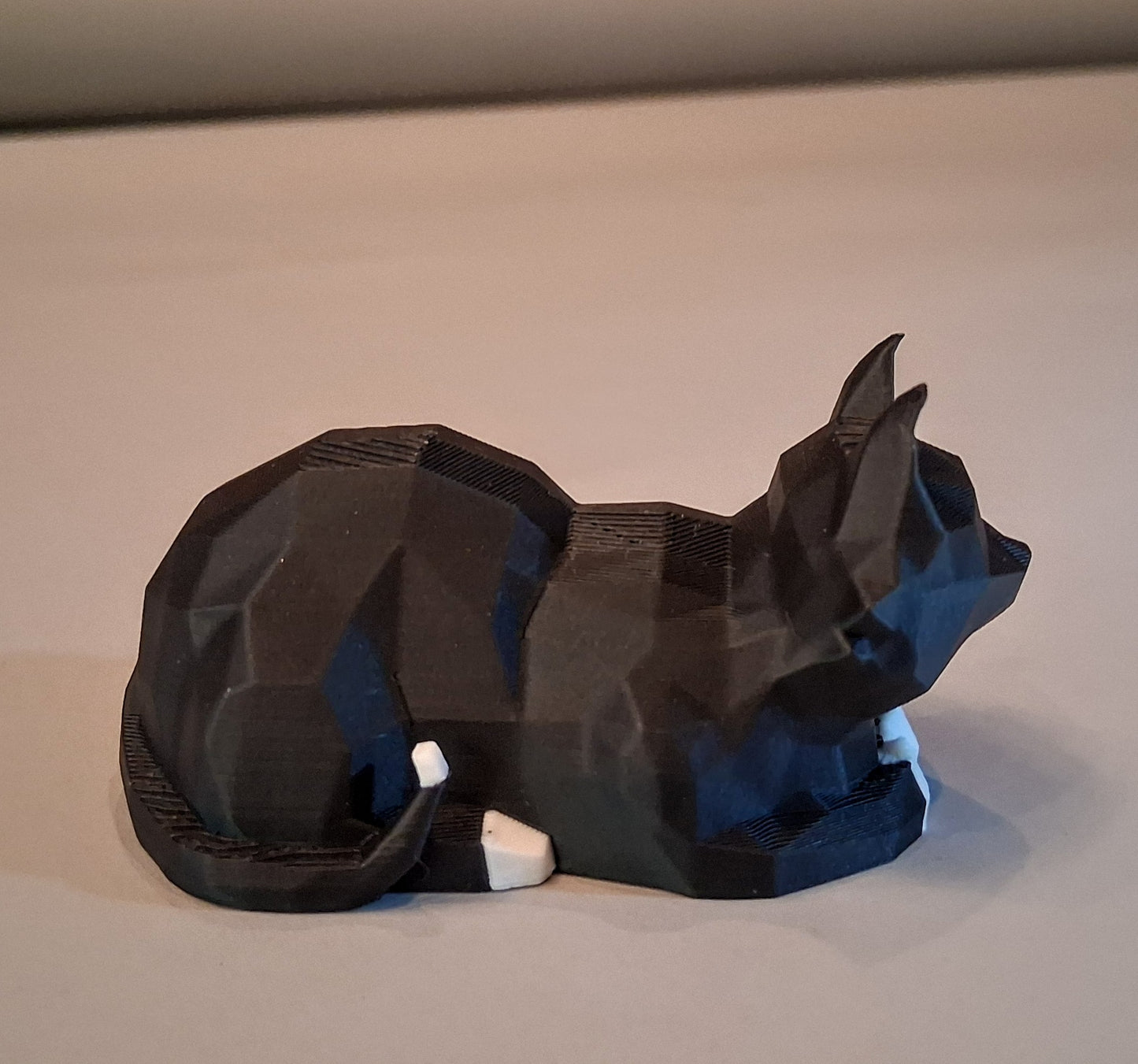 Small Low Poly Loafing Cat